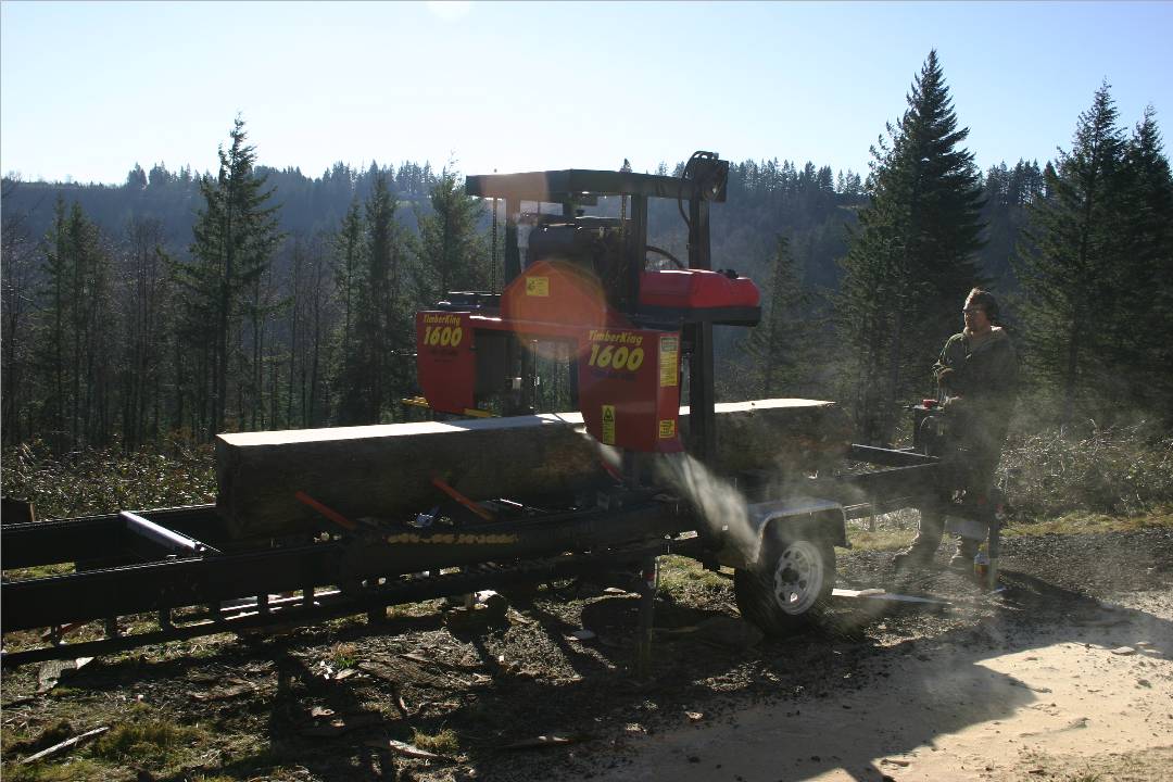 Jeff running the saw. It was cold and windy out that day, but beautiful.